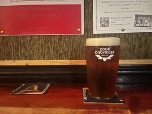 A pint of Four Provinces Piper inside The Cobblestone