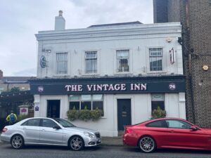 Exterior of The Vintage Inn - imagine how beautiful it would be without the cars