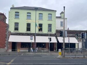 Exterior of Quinns. Yes, locals have asked for the street furniture in the area to be improved, and yet, here we are